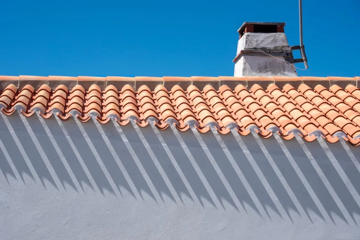 Roof ridge line and chimney on a home in Great Falls, MT