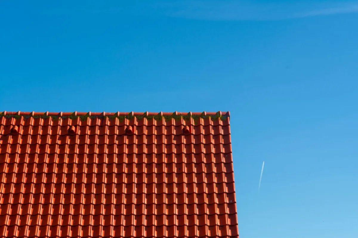 Tile roof gable in full sun, the kind of exposure that sets roof life in Great Falls, MT